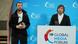 Mstyslav Chernov and Evgeniy Maloletka on stage accepting an award