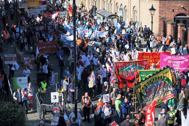 Around 50,000 marched through Manchester in protest at the government's austerity measures as the Conservative Party conference began Around 50,000 marched through Manchester in protest at the government's austerity measures as the Conservative Party conference began