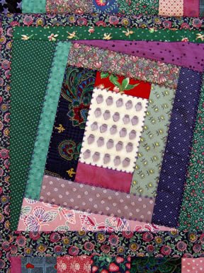 detail of quilt by Robin Atkins, bead artist