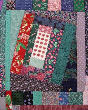 detail of quilt by Robin Atkins, bead artist