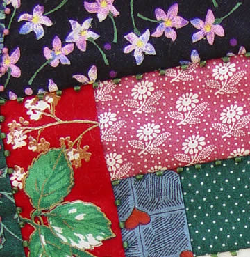 detail of quilt by Robin Atkins, bead artist
