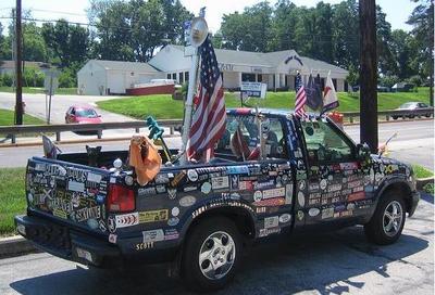 Pickup truck covered with bumper stickers