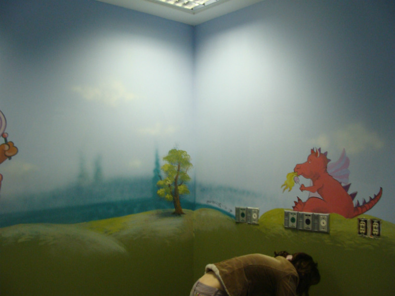 a mural painted on a low wall