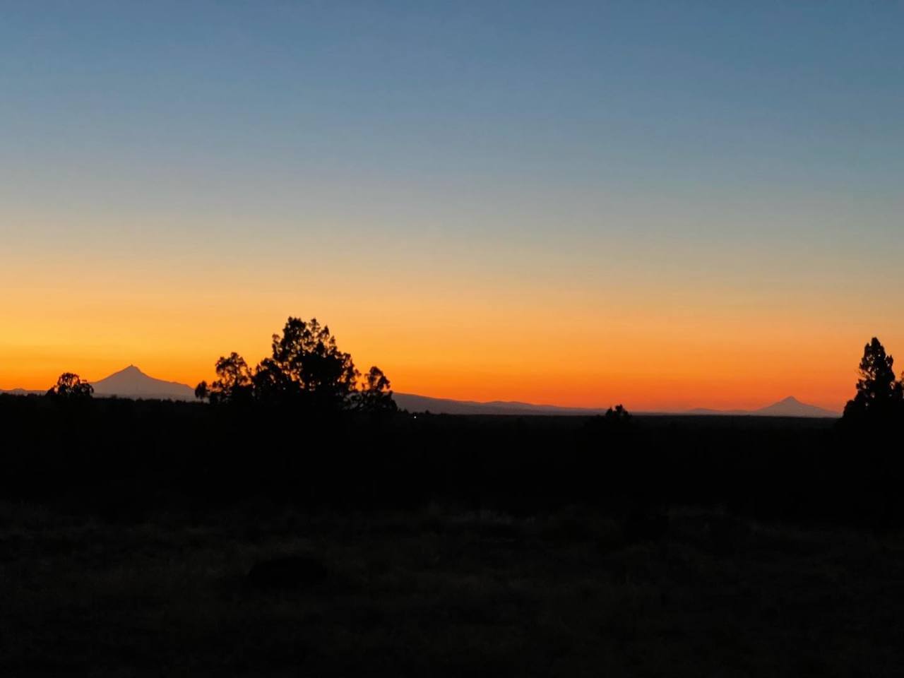 Mt. Jefferson and Mt. Hood were putting on a show while I was on my evening walk. This is straight off my phone—I’ll take some pictures with my real camera tomorrow. https://instagr.am/p/CQpt-Tqh66Y/