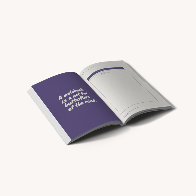 A journal open to an inspirational quote on one page and lined paper on the opposite page.