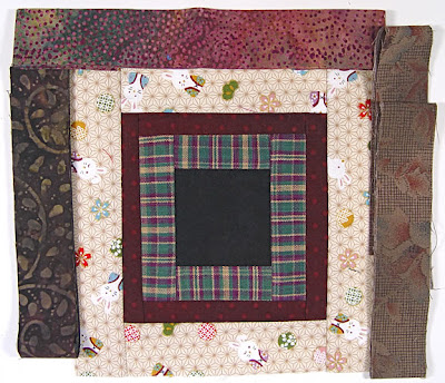 God's Eye Quilt by Robin Atkins, auditioning fabrics 22