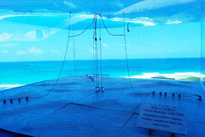 Off Coast of Hawaii A Tall Buoy Bobs and Swings In Water Using Rise and Falling Down of Waves Electricity Produced Off Coast of Hawaii A Tall Buoy Bobs and Swings In Water Using Rise and Falling Down of Waves Electricity Produced
