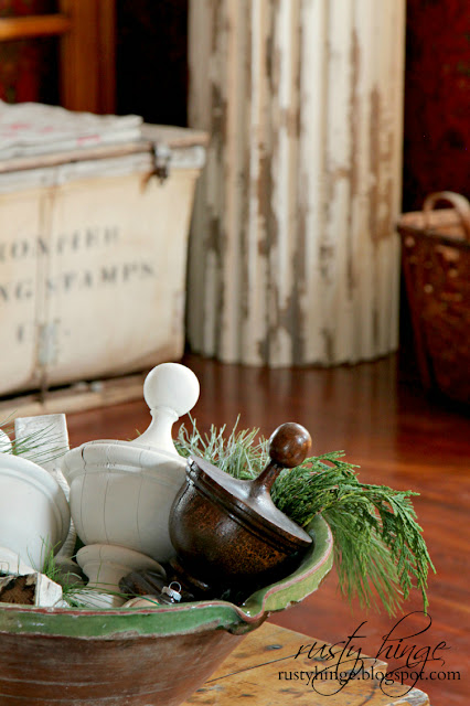 Rusty Hinge 2015 Rustic Meets Refined Christmas Home Tour French pottery Tian bowl filled with vintage porch post finials