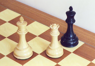 The black king is checkmated; the game is over. The black king is checkmated; the game is over.