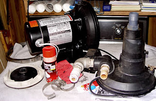 Old and new pump parts, photo by Robin Atkins