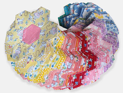 hand pieced hexagon flowers for grandma's flower garden quilt