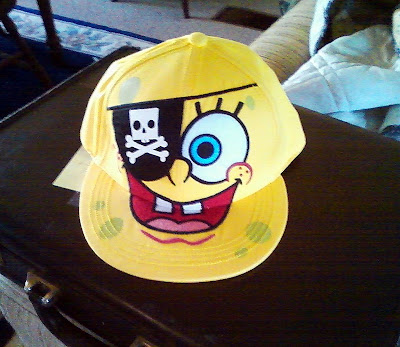 a bright yellow spongebob squarepants baseball cap