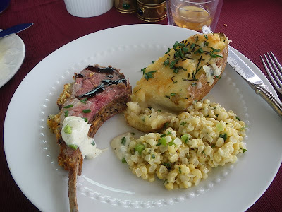 dinner included baked brie, shrimp wrapped in bacon, lamb chops, stuffed baked potatoes, seasoned corn and strawberry shortcake