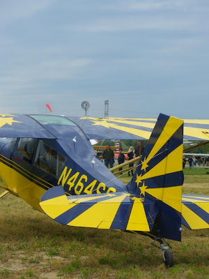 a blue and yellow star spangled plane