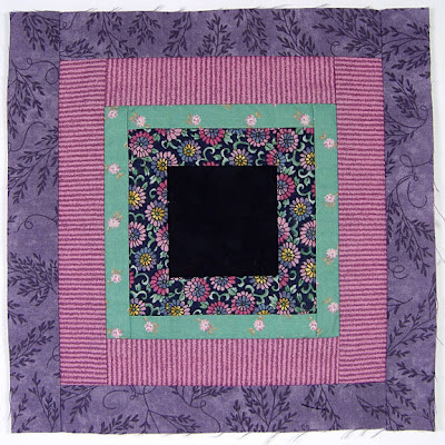 God's Eye quilt by Robin Atkins, auditioning fabrics 20