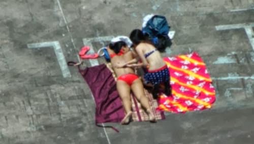 bikini women singapore carpark sun tan