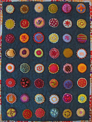 Circles, a wall quilt by Glenys Baker, embroidery on wool applique Circles, a wall quilt by Glenys Baker, embroidery on wool applique