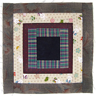 God's Eye Quilt by Robin Atkins, auditioning fabrics 23