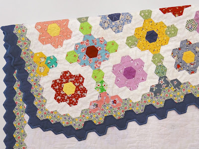 Mama's Garden, Hexie Quilt by Robin Atkins, hand pieced, embroidered, quilted; detail Mama's Garden, Hexie Quilt by Robin Atkins, hand pieced, embroidered, quilted; detail