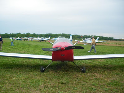 a small red monoplane