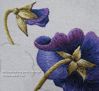 Needlepainted Pansy Flower and Bud: Detail Detail of thread painted embroidered purple pansy flower and bud (Pansies designed by Trish Burr)
