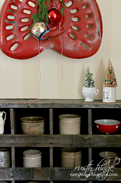 Rusty Hinge 2015 Rustic Meets Refined Christmas Home Tour Vintage Christmas red tractor seat wall decor
