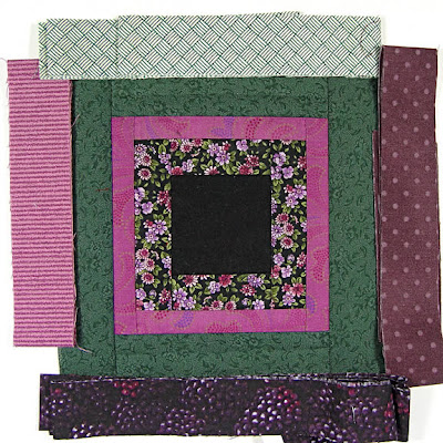 God's Eye Quilt by Robin Atkins, auditioning fabrics 25