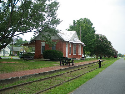 Train station with abandoned railroad tracks