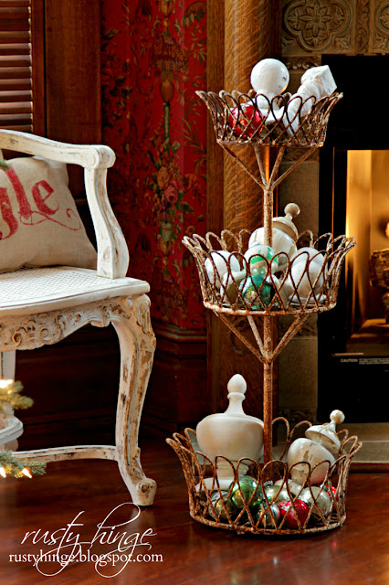 Rusty Hinge 2015 Rustic Meets Refined Christmas Home Tour Tiered Victorian stand with architectural salvage and Shiny Brite ornaments