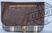 http://lcartera.wordpress.com/2013/11/17/e-tablet-clutch-tutorial/