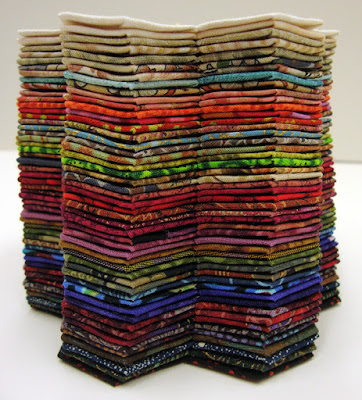 Robin Atkins, hexie quilt, stack of 49 stitched hexie flowers made with Thom Atkins fabric scraps Robin Atkins, hexie quilt, stack of 49 stitched hexie flowers made with Thom Atkins fabric scraps