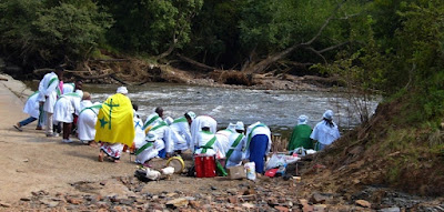 Zionists preparing for baptism at Hennops River zionist baptism
