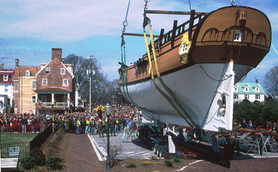 the ship being lowered into the water