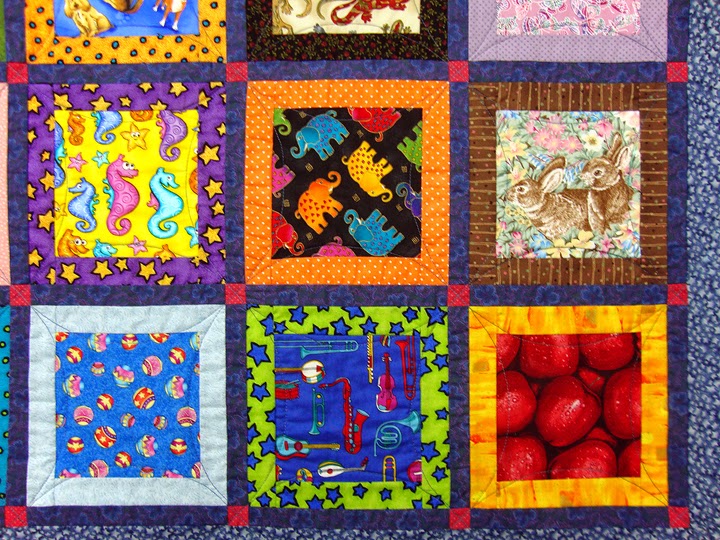 "I Spy a Brown Dog" - detail of quilt by Robin Atkins Robin Atkins, I Spy quilt, front detail