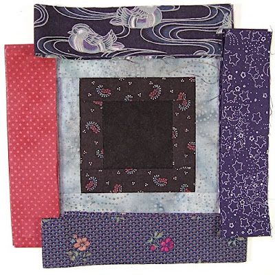 God's Eye quilt by Robin Atkins, auditioning fabrics, 4 choices