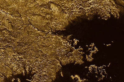 Flooded Canyons on Saturn's Moon Discovered By NASA Flooded Canyons on Saturn's Moon Discovered By NASA