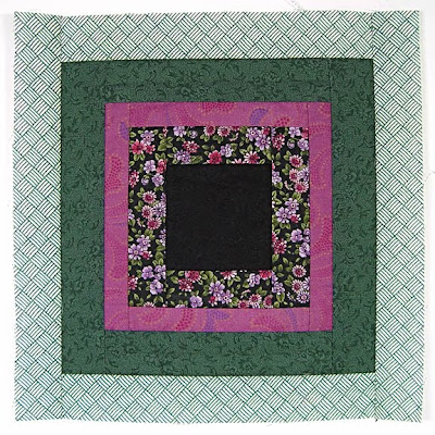 God's Eye Quilt by Robin Atkins, auditioning fabrics 26