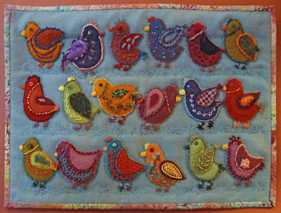 Chicks on Parade, a wall quilt by Dorie Benson, embroidery on wool applique