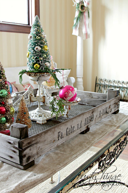 Rusty Hinge 2015 Rustic Meets Refined Christmas Home Tour Christmas vignette of vintage bottle brush trees in a Dutch tulip crate