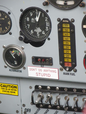 a sign on the instrument panel says dont do anything stupid