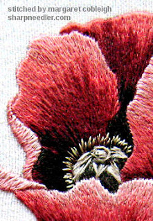 Trish Burr Red Poppy: Close-up of Centre Close-up of thread paintined red poppy centre