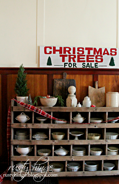Rusty Hinge 2015 Rustic Meets Refined Christmas Home Tour Christmas Trees For Sale sign above chicken nester filled with ironstone