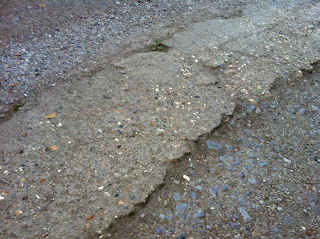 lumpy uneven paving that wheelchair wheels are prone to catching on and making you land on your chin #2