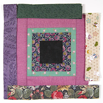God's Eye quilt by Robin Atkins, auditioning fabrics 19