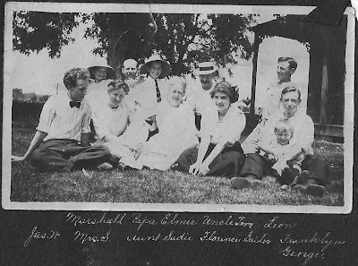 a crowd of people down on the farm
