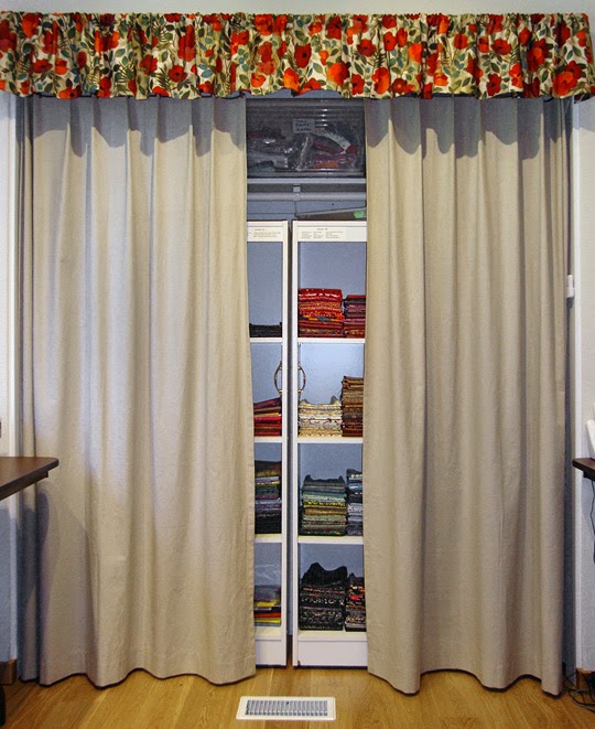 frabric storage system: closet curtains close to protect fabrics from light damage and dust frabric storage system: closet curtains close to protect fabrics from light damage and dust