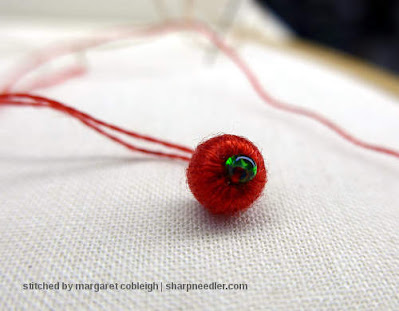 Stumpwork: Wrapped Bead Bead wrapped in red thread for stumpwork. (Stumpwork and thread painted hedgehog)
