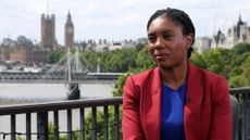 Kemi Badenoch giving an interview with Parliament and the Thames in the background