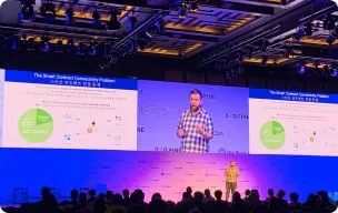 Sergey speaking at conference photo