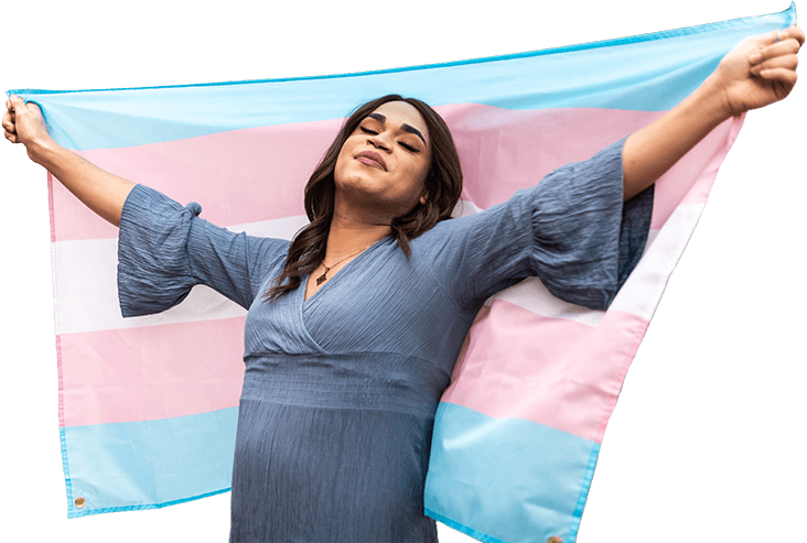 A woman proudly holds a transgender flag, symbolizing support for the transgender community and its rights.